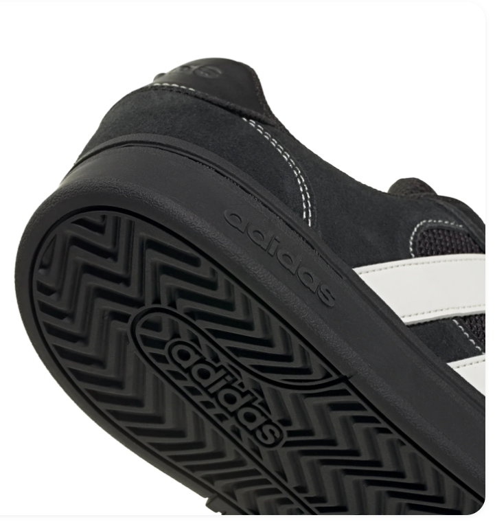 Adidas Black & White Low-Top Sneakers with Contrast Stitching