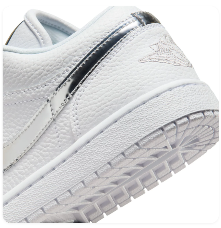 Air Jordan 1 Low White Sneakers with Metallic Silver Accents