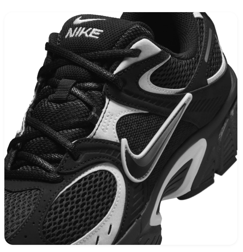 Nike Black Mesh Sneakers with Silver Accents & Chunky Sole