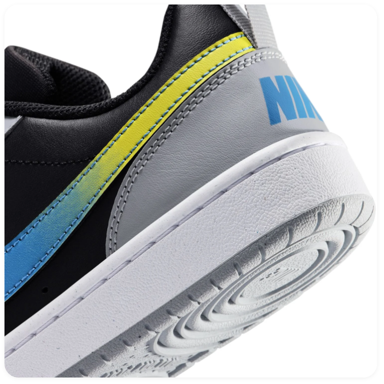 Nike Black & Grey Low-Top Sneakers with Blue-to-Yellow Gradient Swoosh