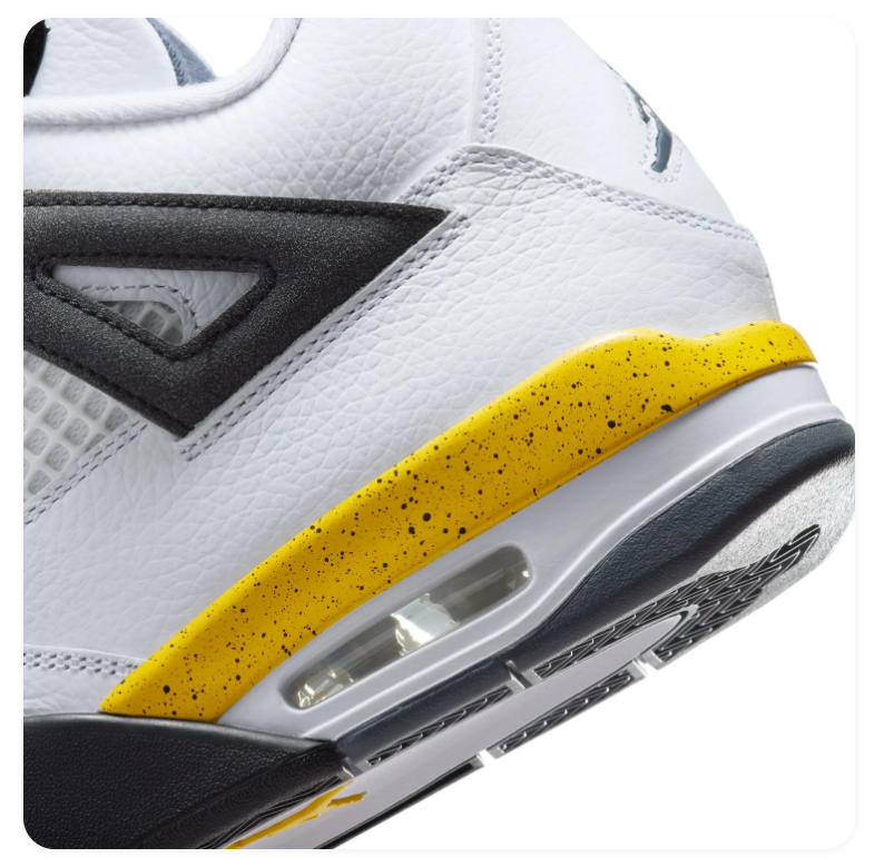 Air Jordan 4 White & Black Sneakers with Yellow Accents