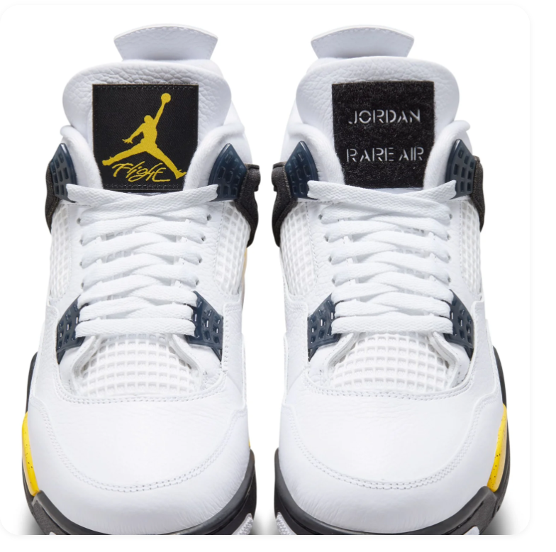 Air Jordan 4 White & Black Sneakers with Yellow Accents