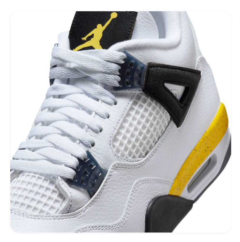 Air Jordan 4 White & Black Sneakers with Yellow Accents